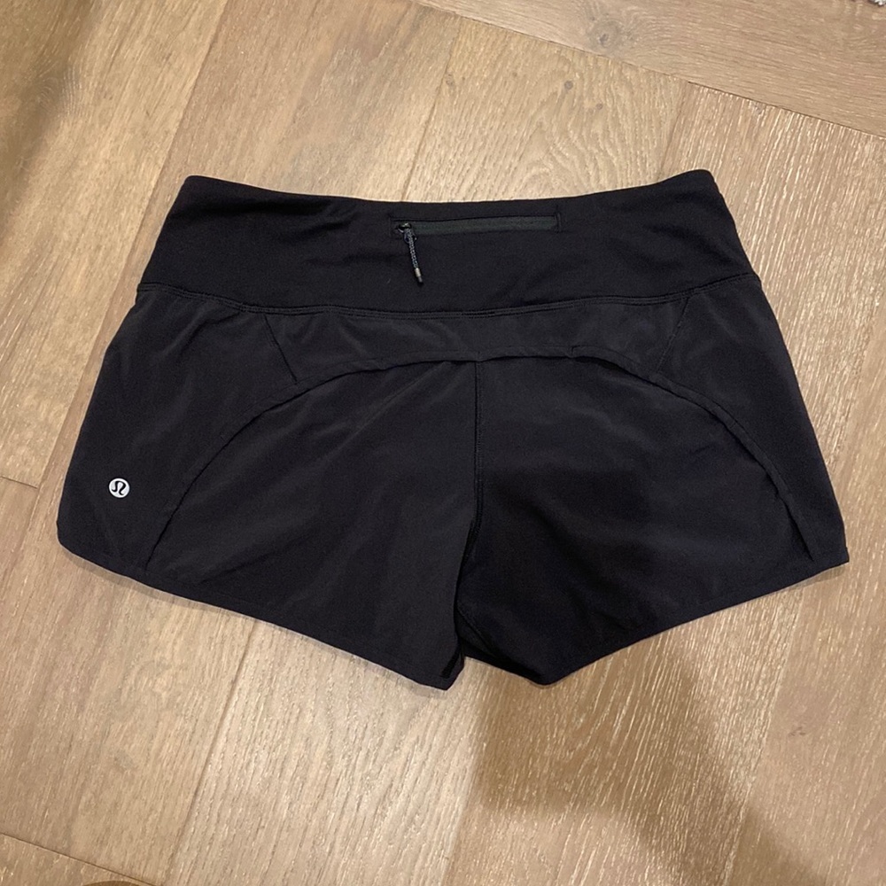 Size 6 women’s black run times shorts- like new barely worn